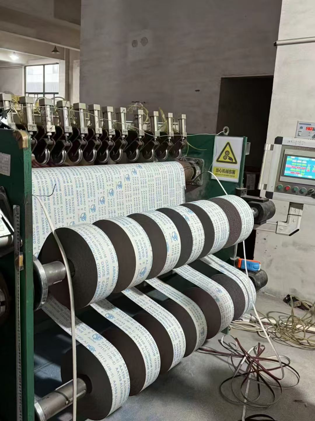 Abrasive paper production machinery