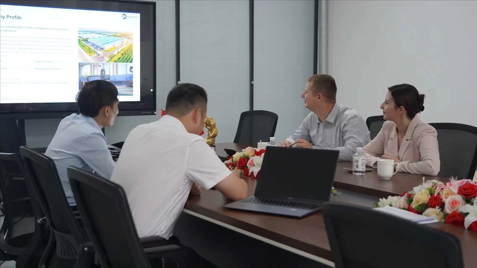 Buyers and supplier representatives discussing a purchasing brief