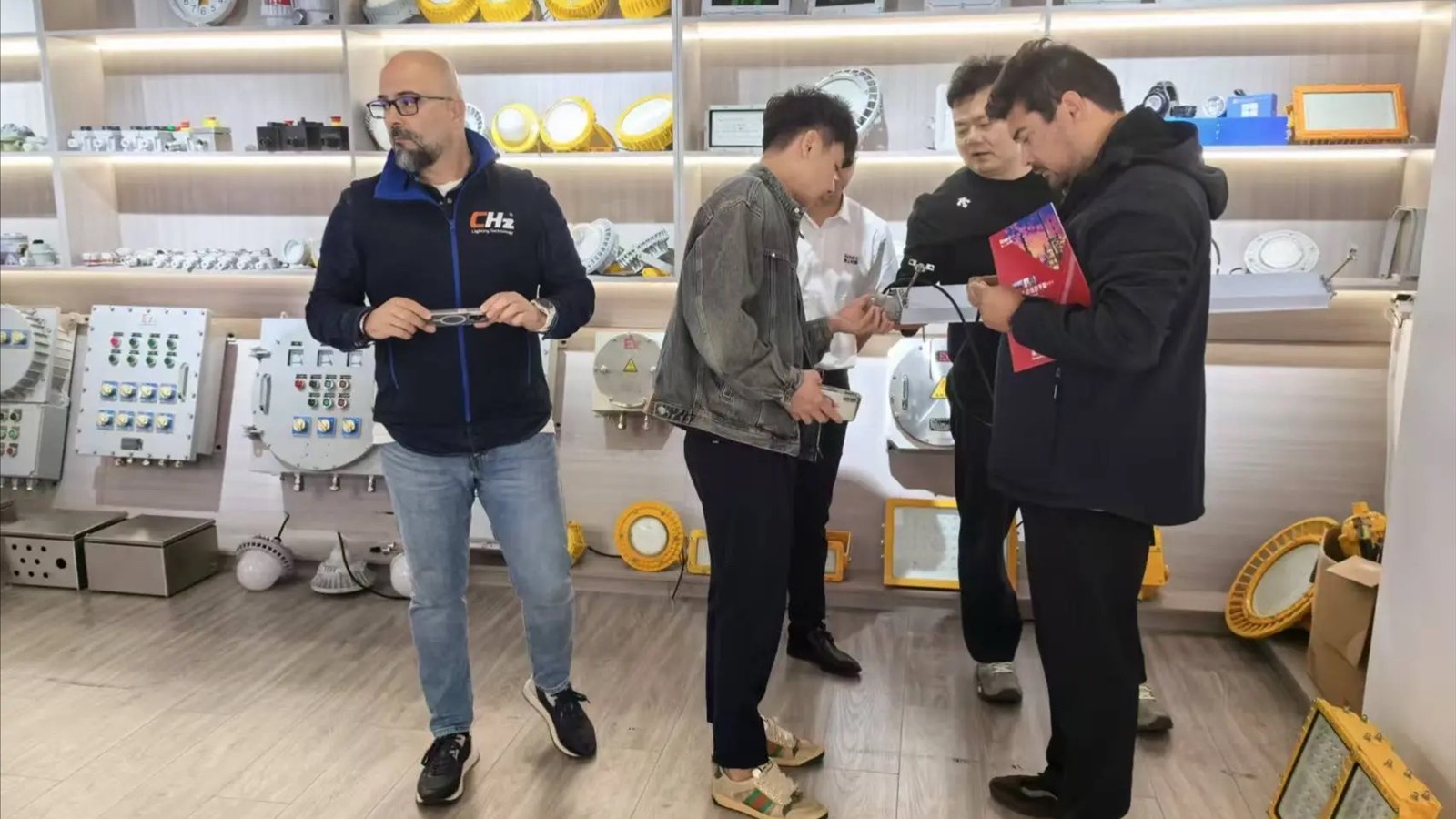 Visitors reviewing product samples in a supplier showroom